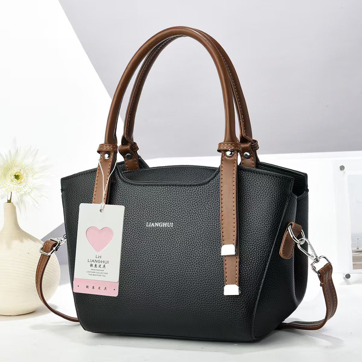 Spacious dual-purpose Handbag and Sling Bag