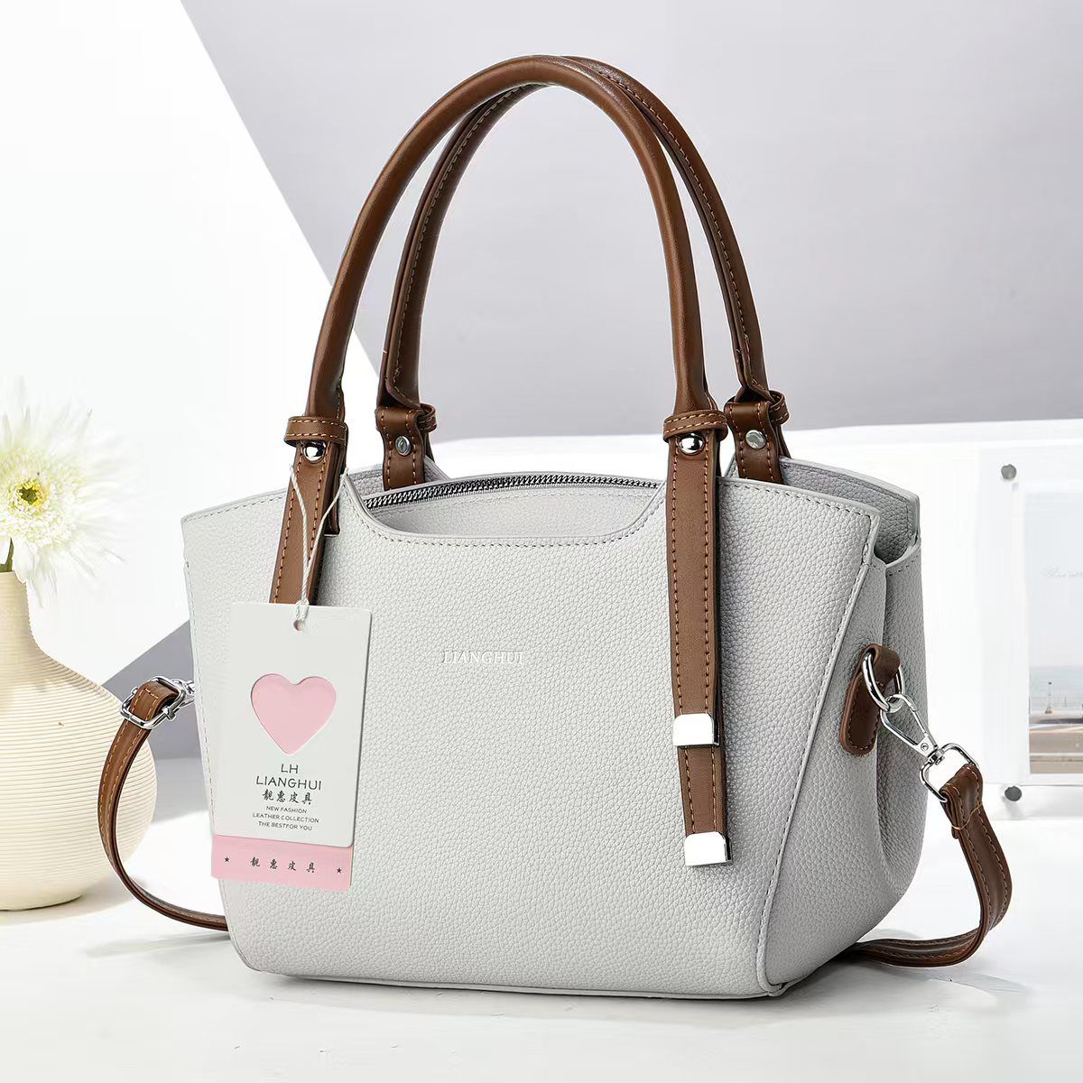 Spacious dual-purpose Handbag and Sling Bag