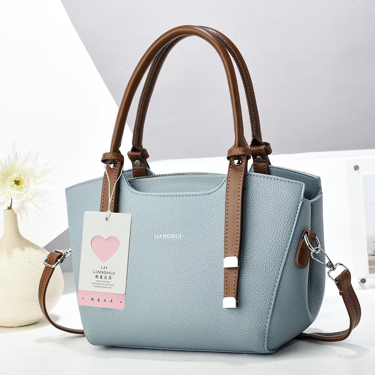 Spacious dual-purpose Handbag and Sling Bag
